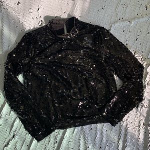 Long sleeved sequined shirt